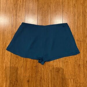 Peacock blue mini shorts.
